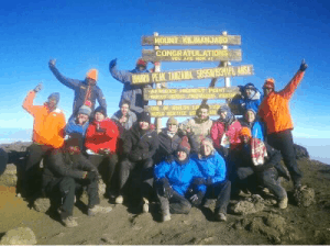 Iain Jenkins top right of the picture at the summit.